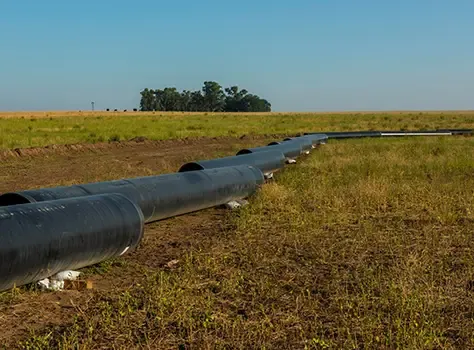 Pipeline laid across a field, ready for reinstatement.